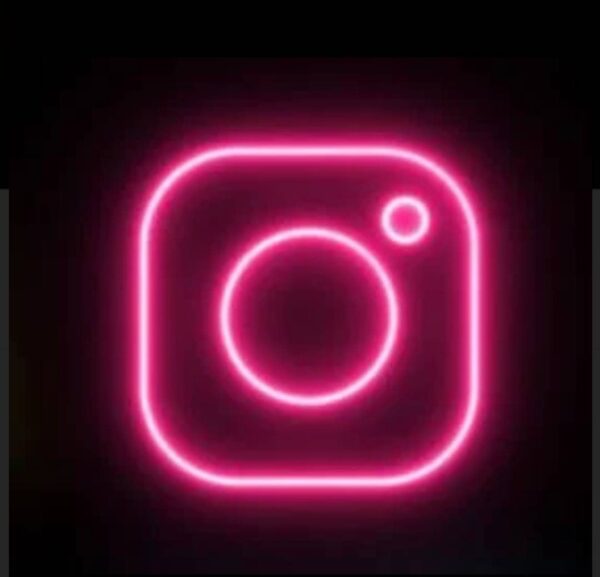 A glowing neon sign depicting the Instagram logo in vibrant colors, adding a modern and trendy touch to any space.