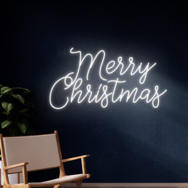 A glowing neon sign with the phrase 'Merry Christmas' in vibrant colors, evoking joy and celebration for the holiday season.