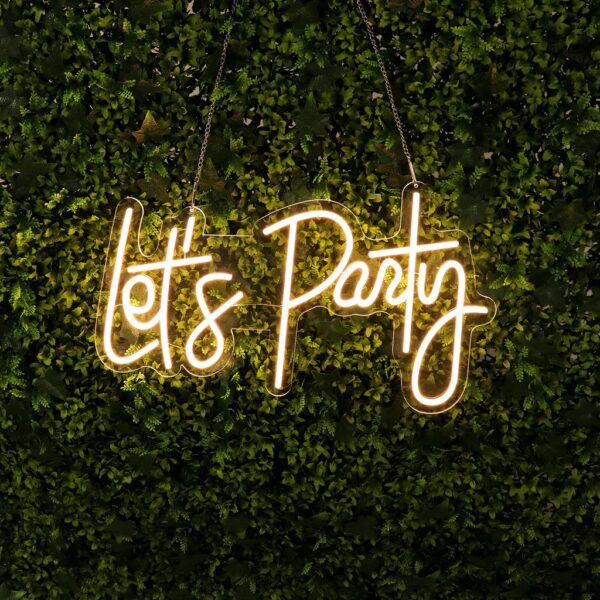 A glowing neon sign with the phrase 'Let's Party' in vibrant colors, evoking excitement and fun.