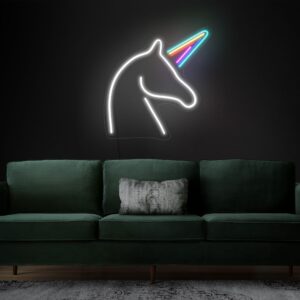 A glowing neon sign depicting the silhouette of a unicorn in vibrant colors, evoking whimsy and magic.