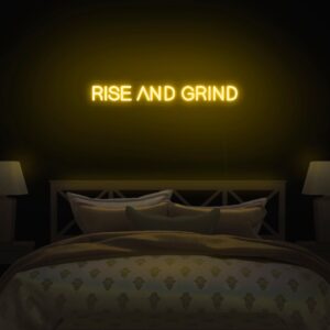 A glowing neon sign with the phrase 'Rise and Grind' in vibrant colors, evoking determination and hustle.