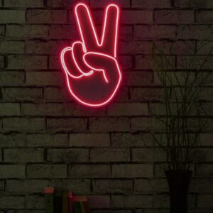 A glowing neon sign depicting the victory hand gesture in vibrant colors, symbolizing triumph and success.