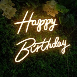 A glowing neon sign with the phrase 'Happy Birthday' in colorful letters, evoking celebration and joy.