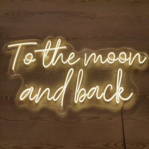 A glowing neon sign with the phrase 'To the Moon and Back' in vibrant colors, symbolizing boundless love and affection.