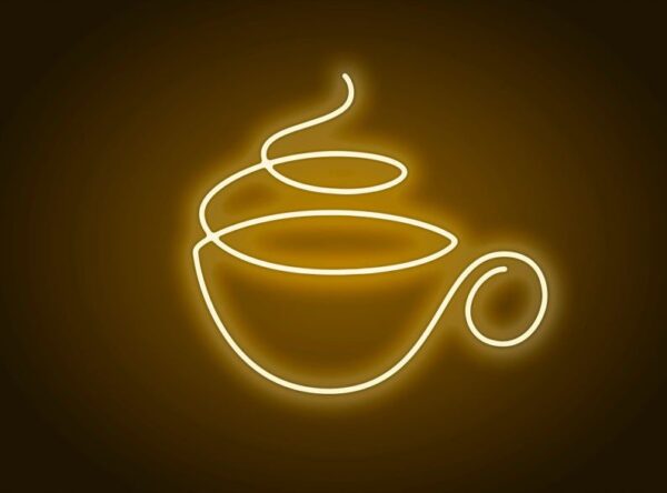 Neon sign shaped like a steaming teacup with the word 'Tea' in cursive, glowing in soothing green and white colors against a dark background.